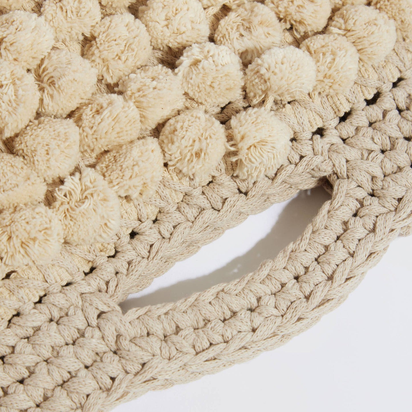 “Nadia pom-pom” handbag
