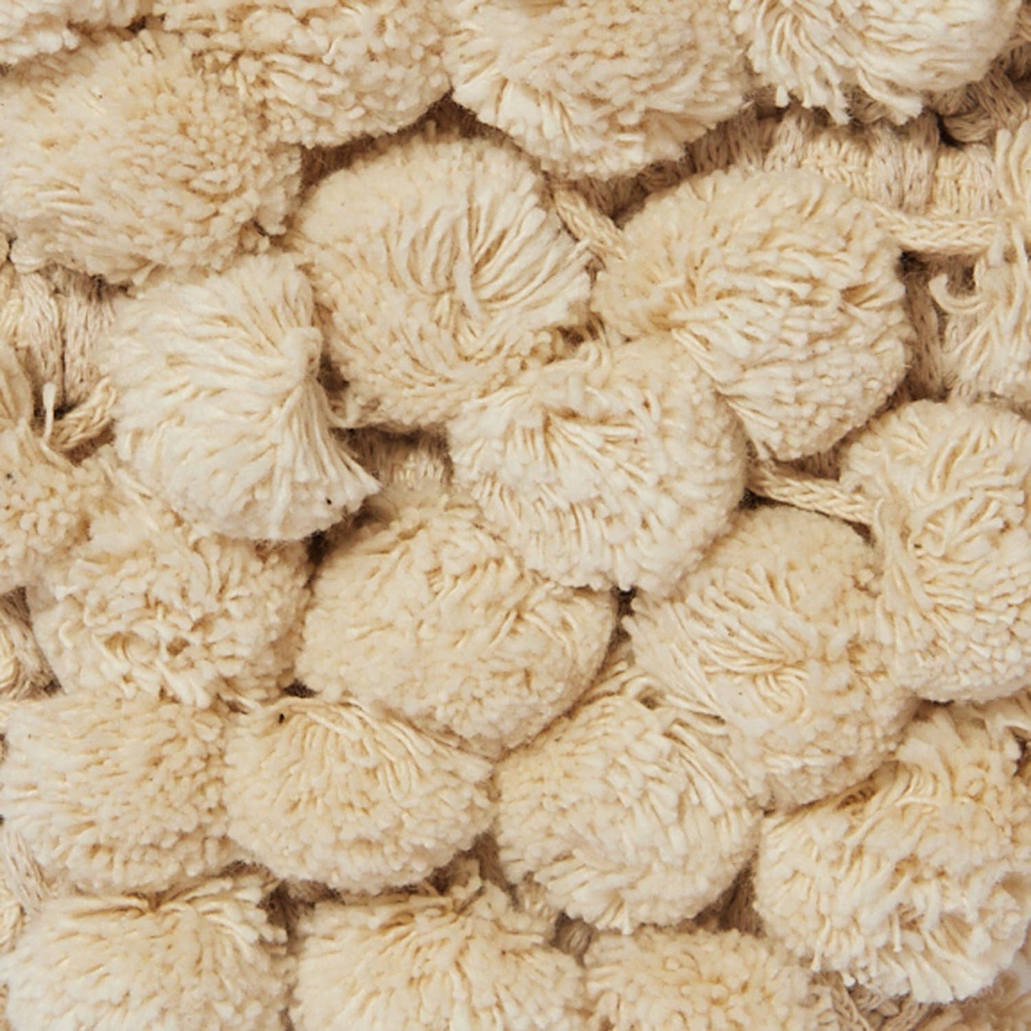 “Nadia pom-pom” handbag