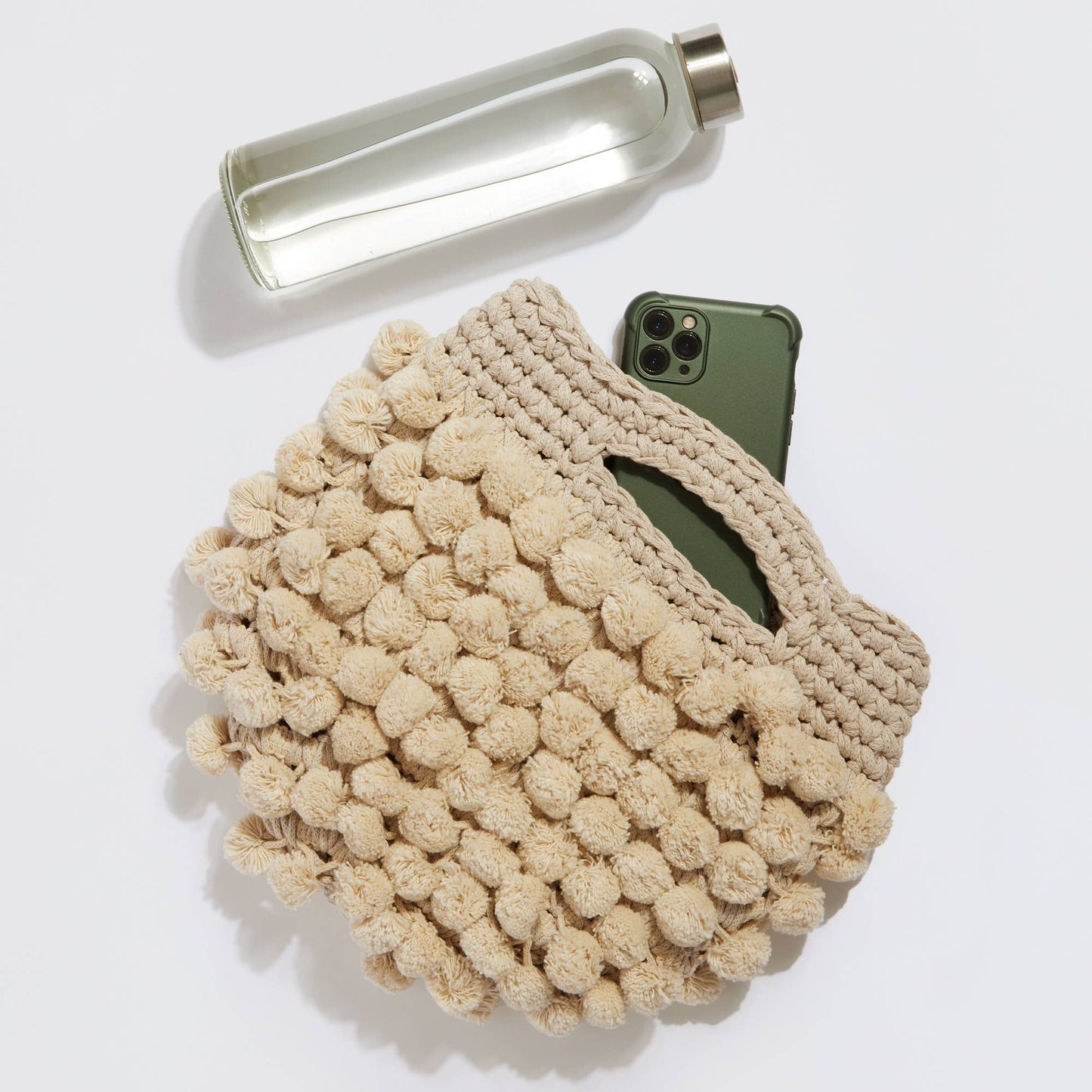 “Nadia pom-pom” handbag
