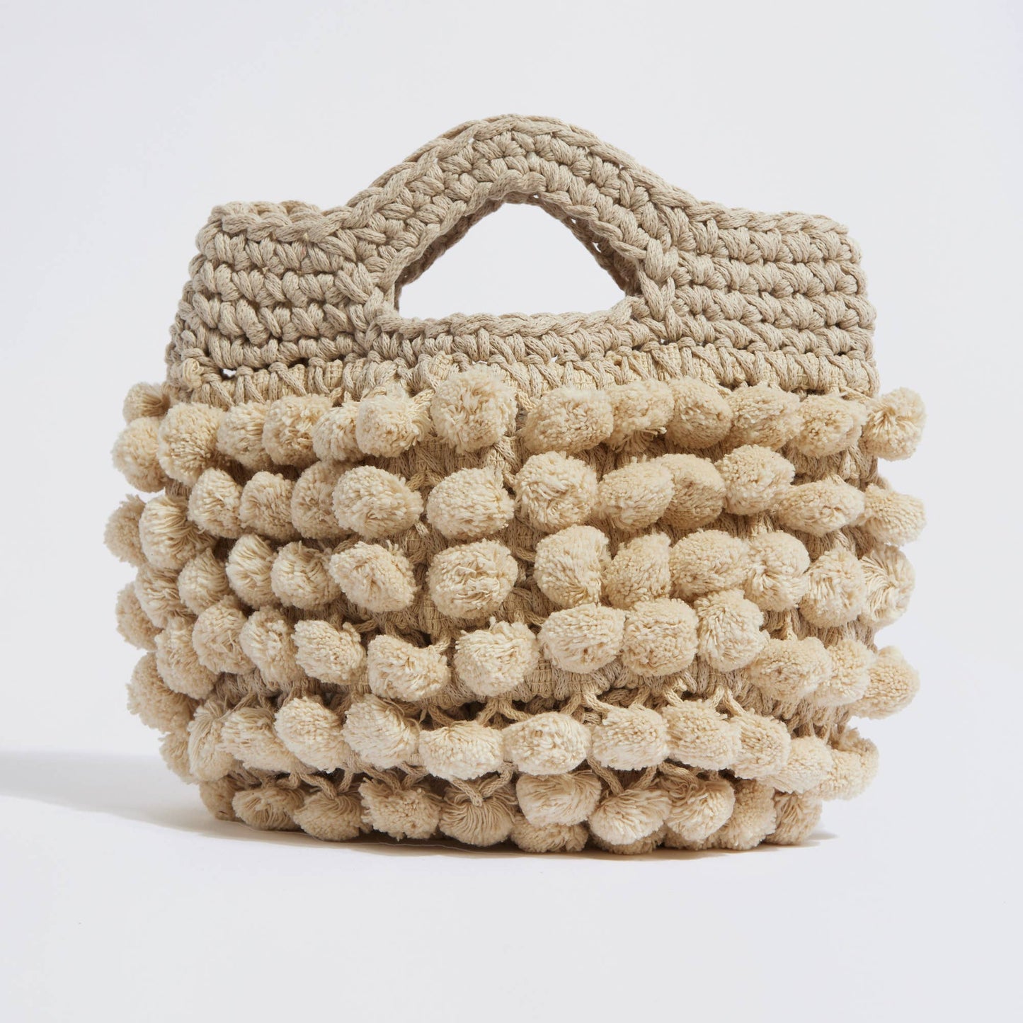 “Nadia pom-pom” handbag