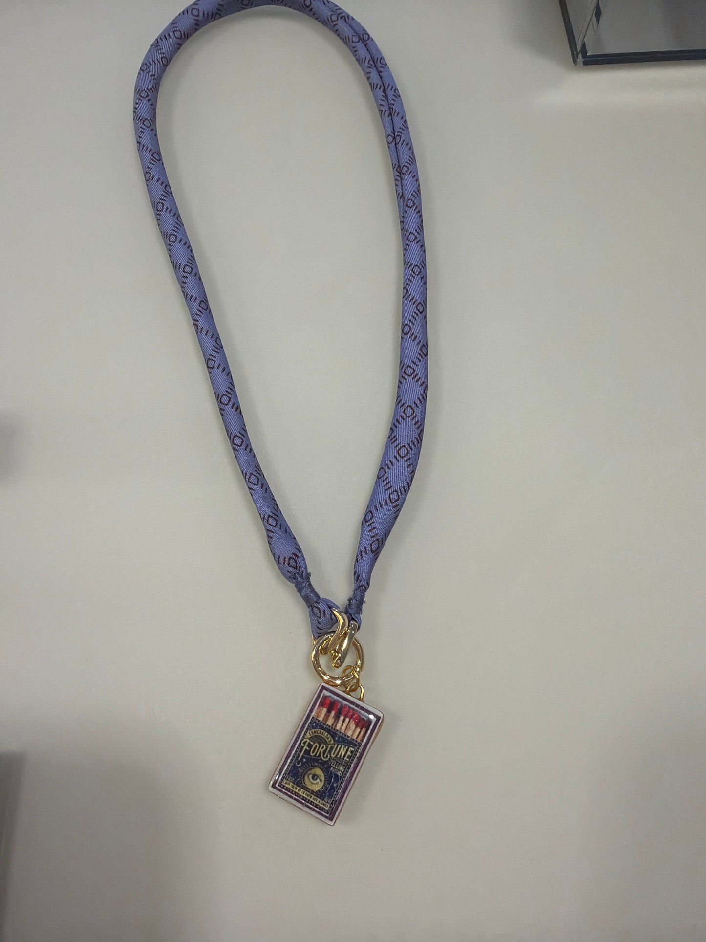 Repurposed silk scarf with porcelain with charm