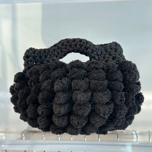 “Nadia pom-pom” handbag