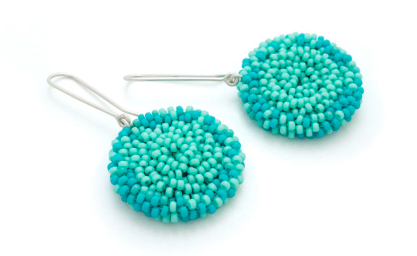 Claudia Farjardo round woven earrings