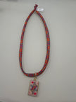 Repurposed silk scarf with charm